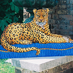Free standing painting of a leopard, painted on wood